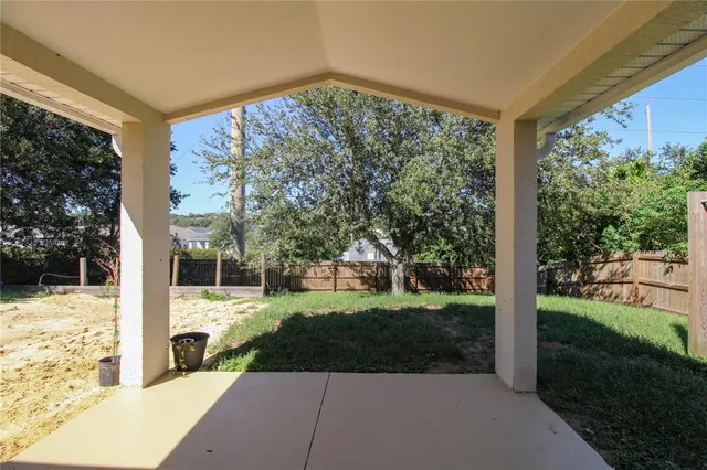 a view of a porch with a yard