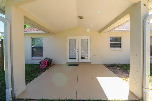 a view of a porch of a house