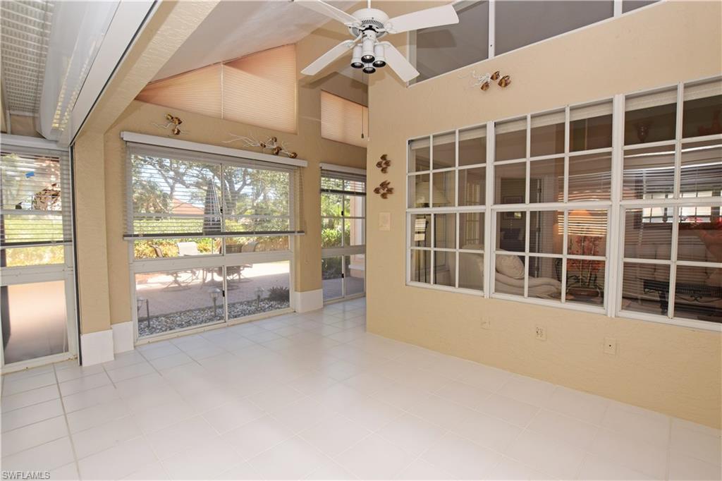 107 Napa Ridge Way Naples, FL 34119 - Photo 26 of 26 a view of an empty room with a window