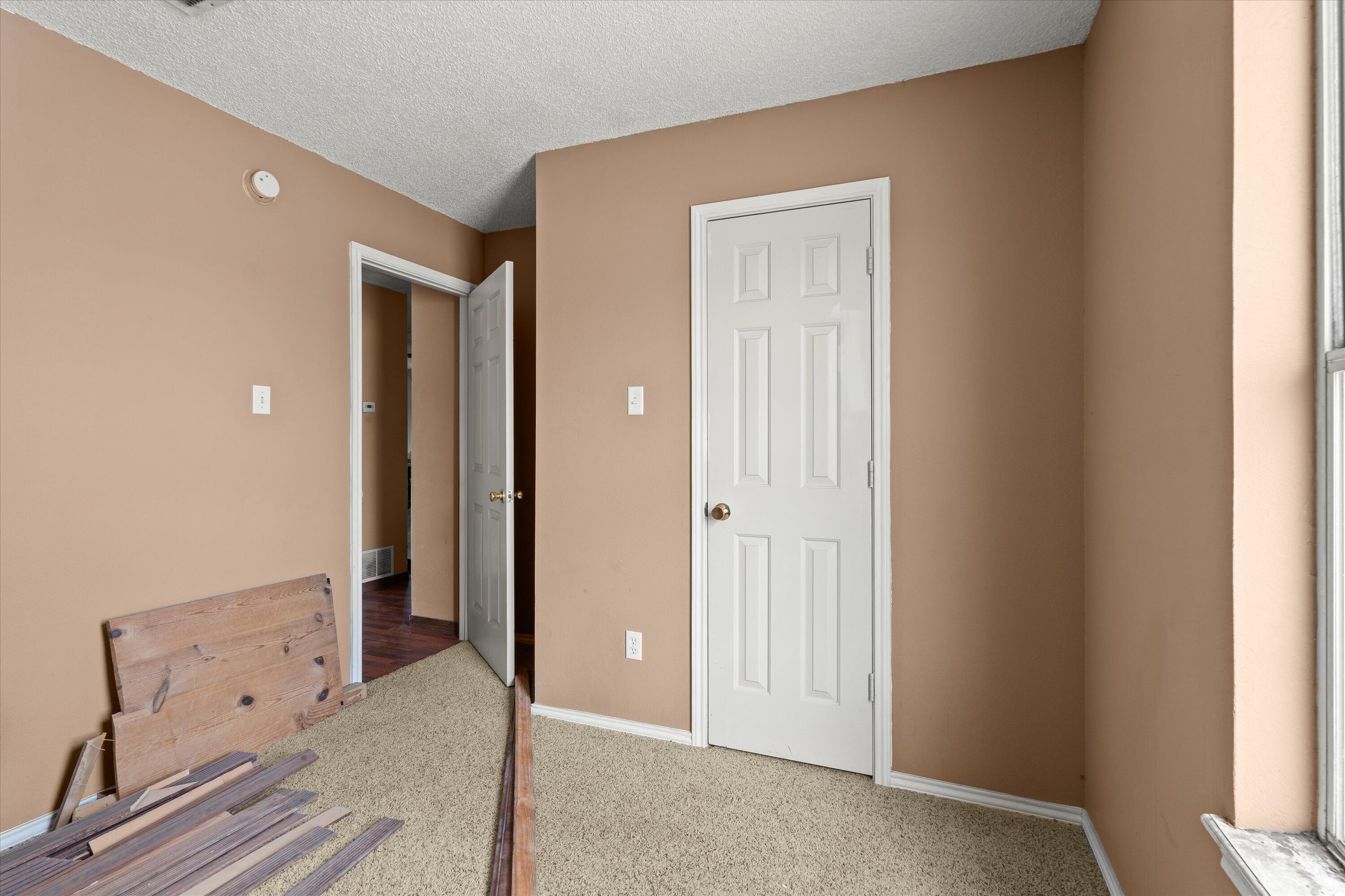 1605 Corpus Avenue Wolfforth, TX 79382 - Photo 16 of 20 an empty room with windows and closet