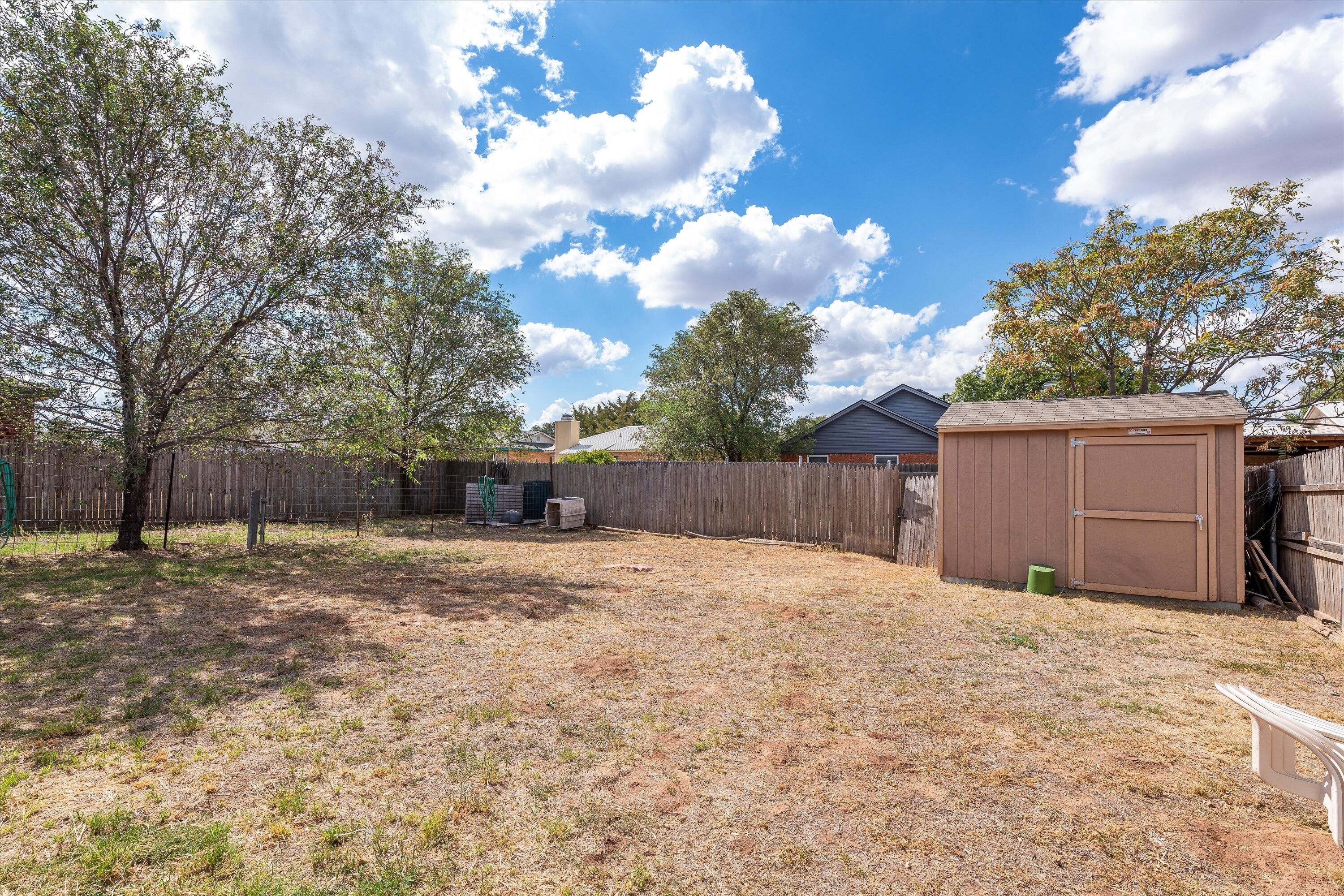 1605 Corpus Avenue Wolfforth, TX 79382 - Photo 18 of 20 a house with yard in front of it