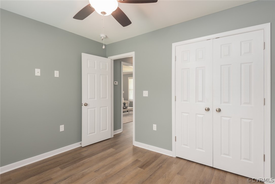 2070 Genito Road Moseley, VA 23120 - Photo 16 of 44 wooden floor in an empty room