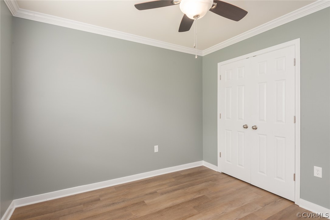 2070 Genito Road Moseley, VA 23120 - Photo 20 of 44 an empty room with a window and a ceiling fan