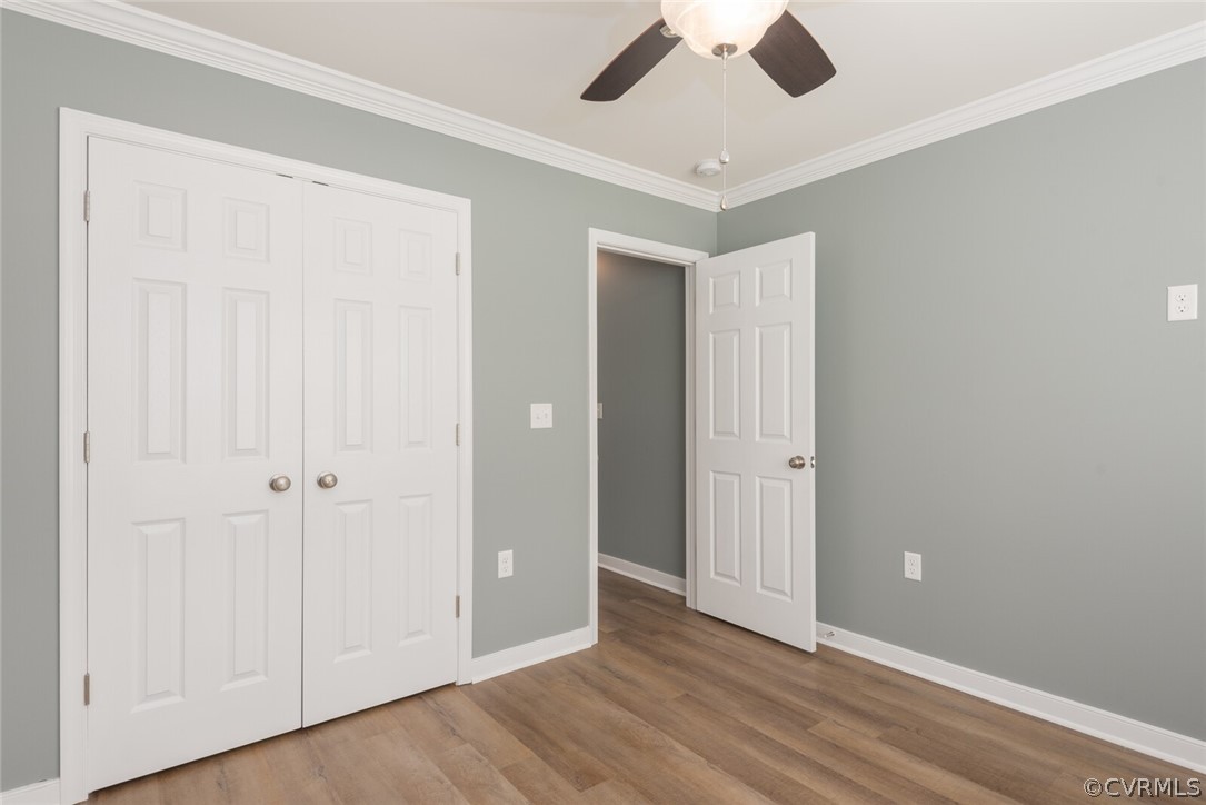 2070 Genito Road Moseley, VA 23120 - Photo 21 of 44 an empty room with ceiling fan and window