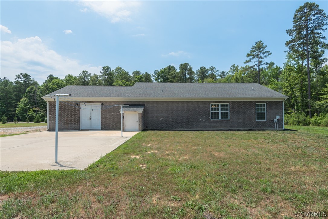 2070 Genito Road Moseley, VA 23120 - Photo 26 of 44 front view of a house with a yard