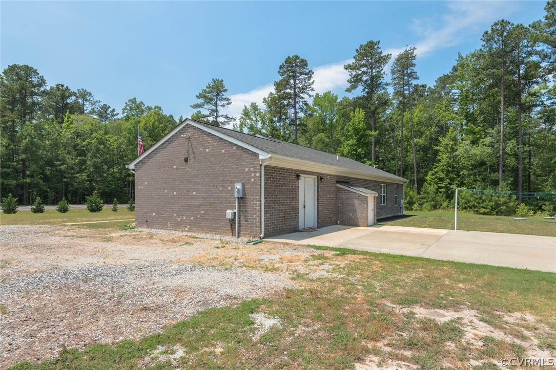 2070 Genito Road Moseley, VA 23120 - Photo 28 of 44 a house with yard in front of it