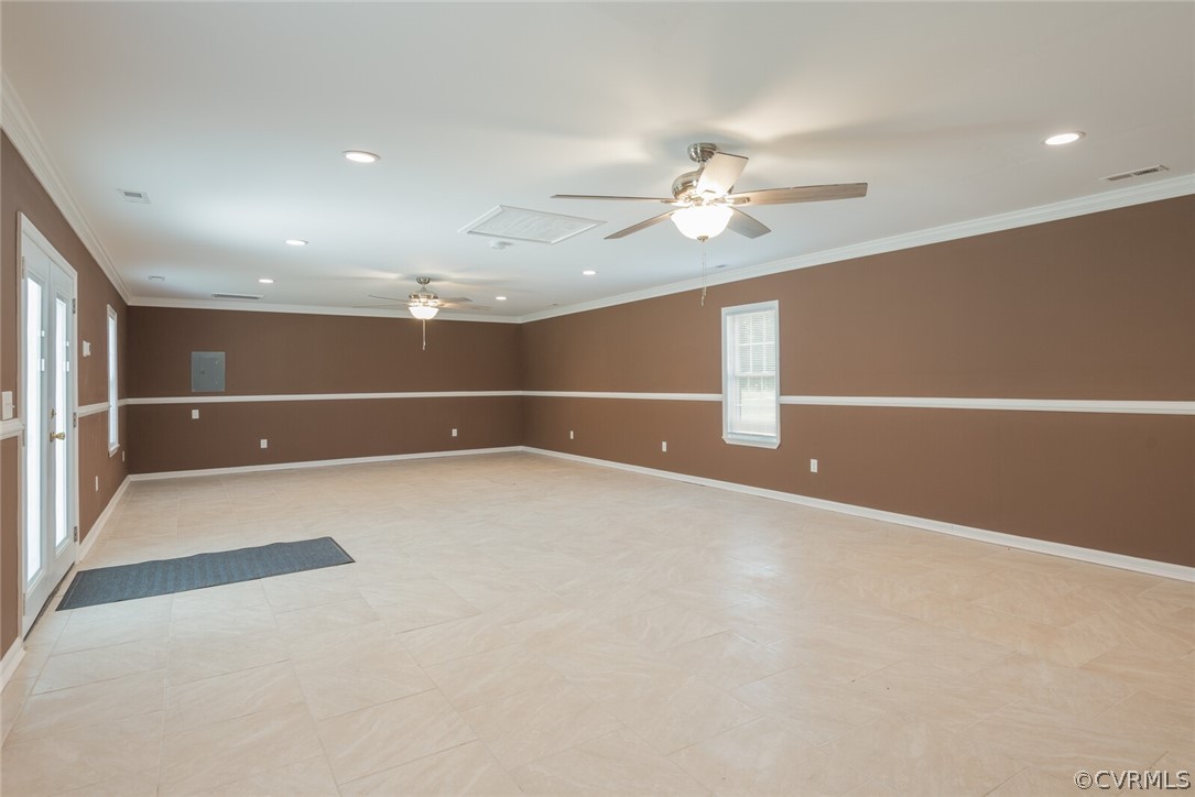 2070 Genito Road Moseley, VA 23120 - Photo 30 of 44 an empty room with windows and fan