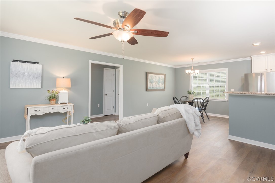 2070 Genito Road Moseley, VA 23120 - Photo 3 of 44 a living room with furniture and a window