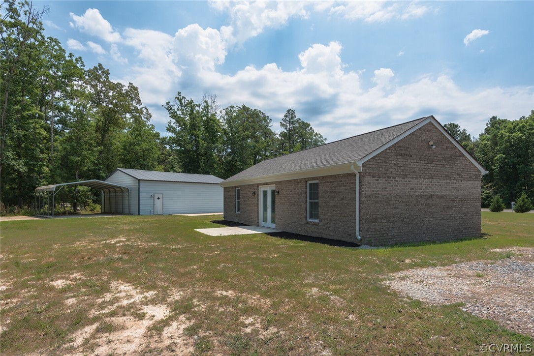 2070 Genito Road Moseley, VA 23120 - Photo 39 of 44 a view of an house with backyard space and garden