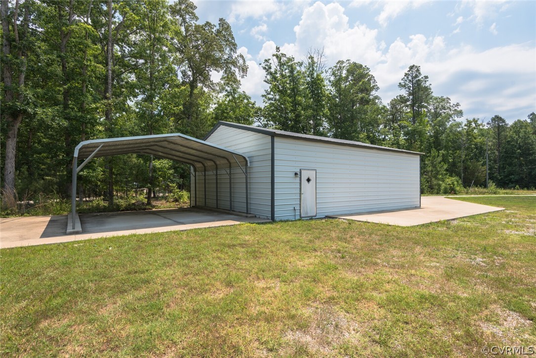 2070 Genito Road Moseley, VA 23120 - Photo 41 of 44 a view of a backyard with basket ball court