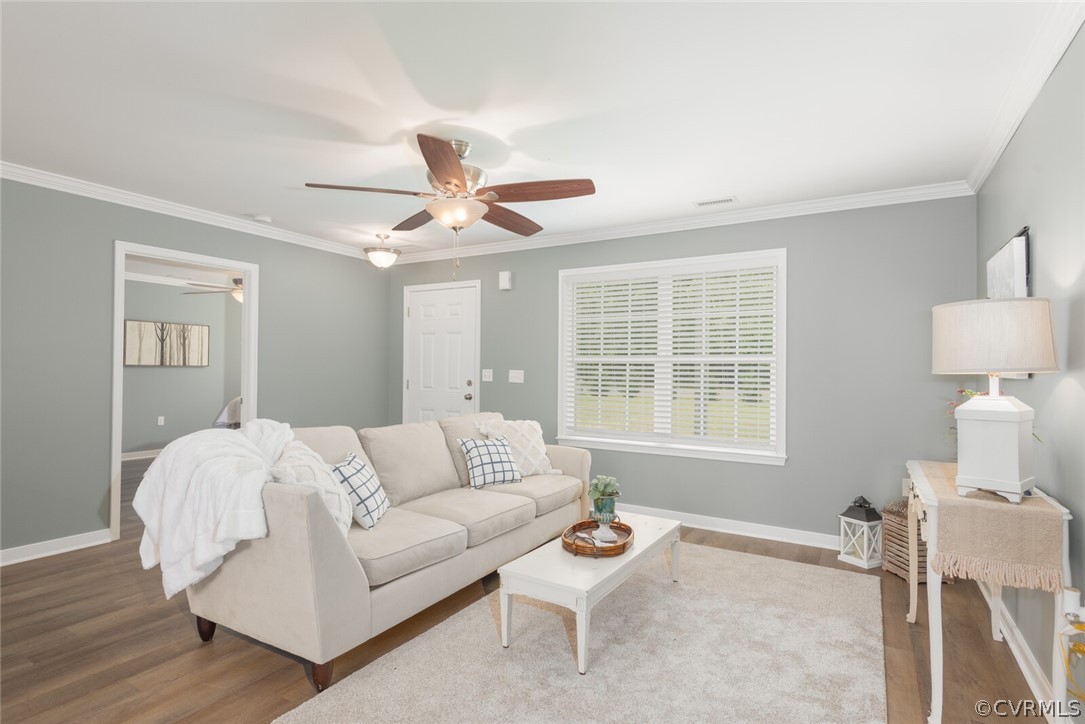 2070 Genito Road Moseley, VA 23120 - Photo 6 of 44 a living room with furniture and a window