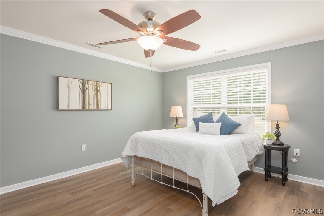 2070 Genito Road Moseley, VA 23120 - Photo 10 of 44 a bedroom with a bed and a window
