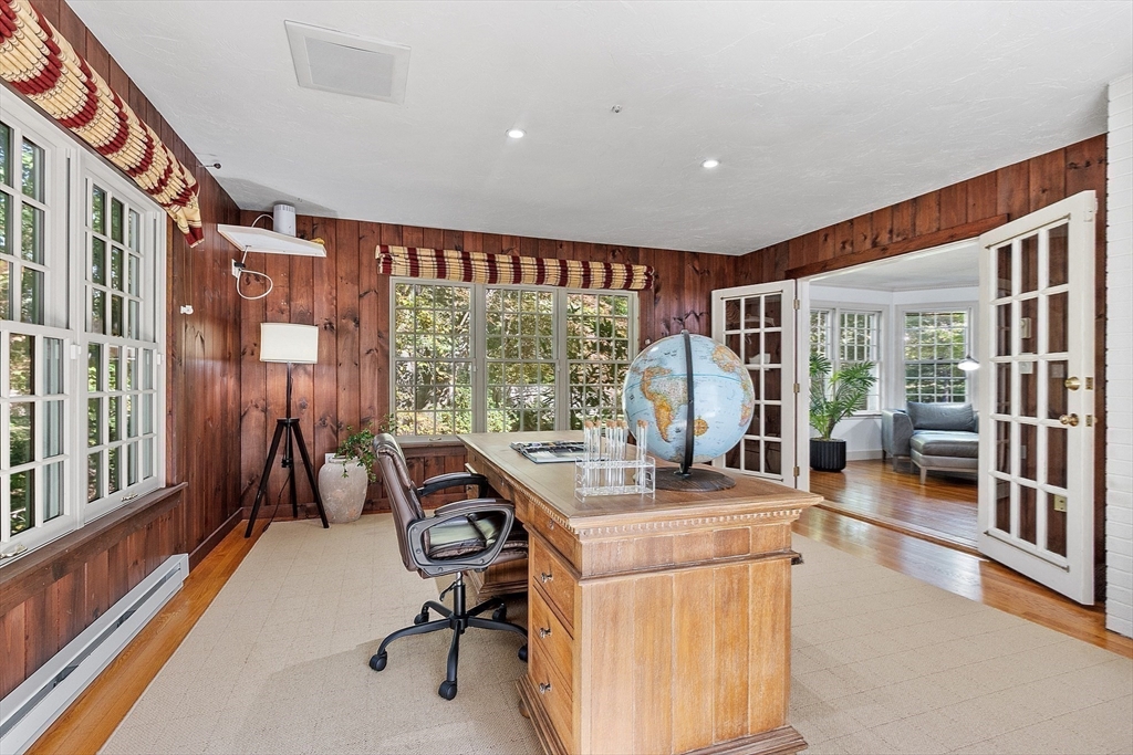 2 Partridge Hill Road Dover, MA 02030 - Photo 7 of 31 a view of a workspace with furniture and a gate