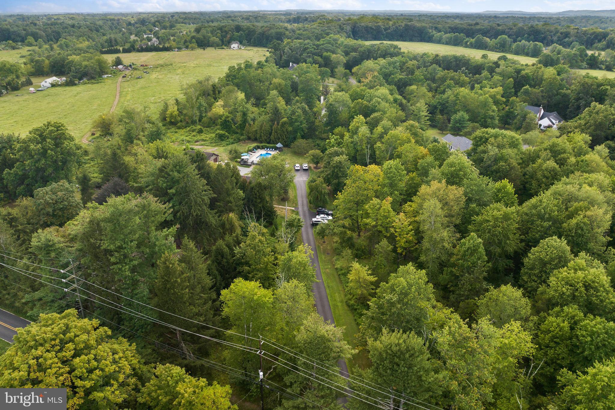 409 Federal City Road Pennington, NJ 08534 - Photo 54 of 54 an aerial view of residential houses with outdoor space and trees