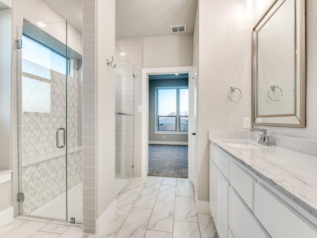 139 Lakeview Circle Pilot Point, TX 76258 - Photo 8 of 19 Bathroom with a wealth of natural light, visible vents, and marble finish floor