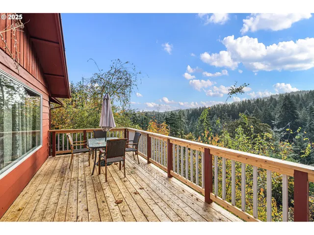 a view of balcony with furniture