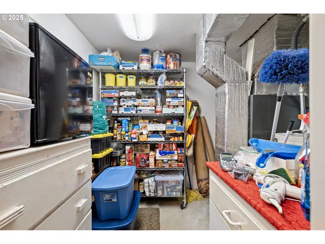 a reading room with furniture and a book shelf
