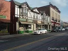 a view of a building and a street