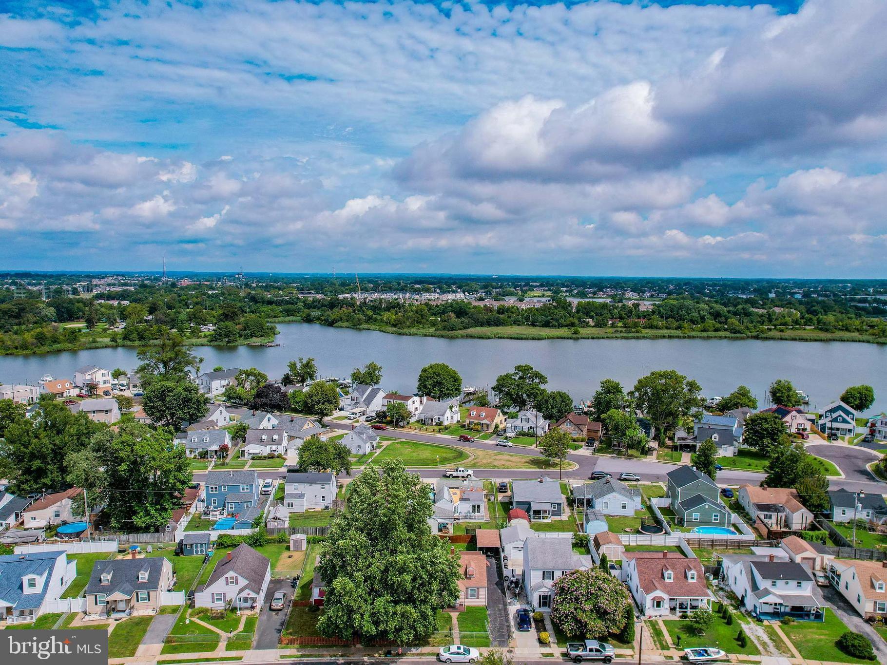 8222 Cornwall Road Dundalk, MD 21222 - Photo 3 of 31 an aerial view of a city with lots of residential buildings lake and ocean view