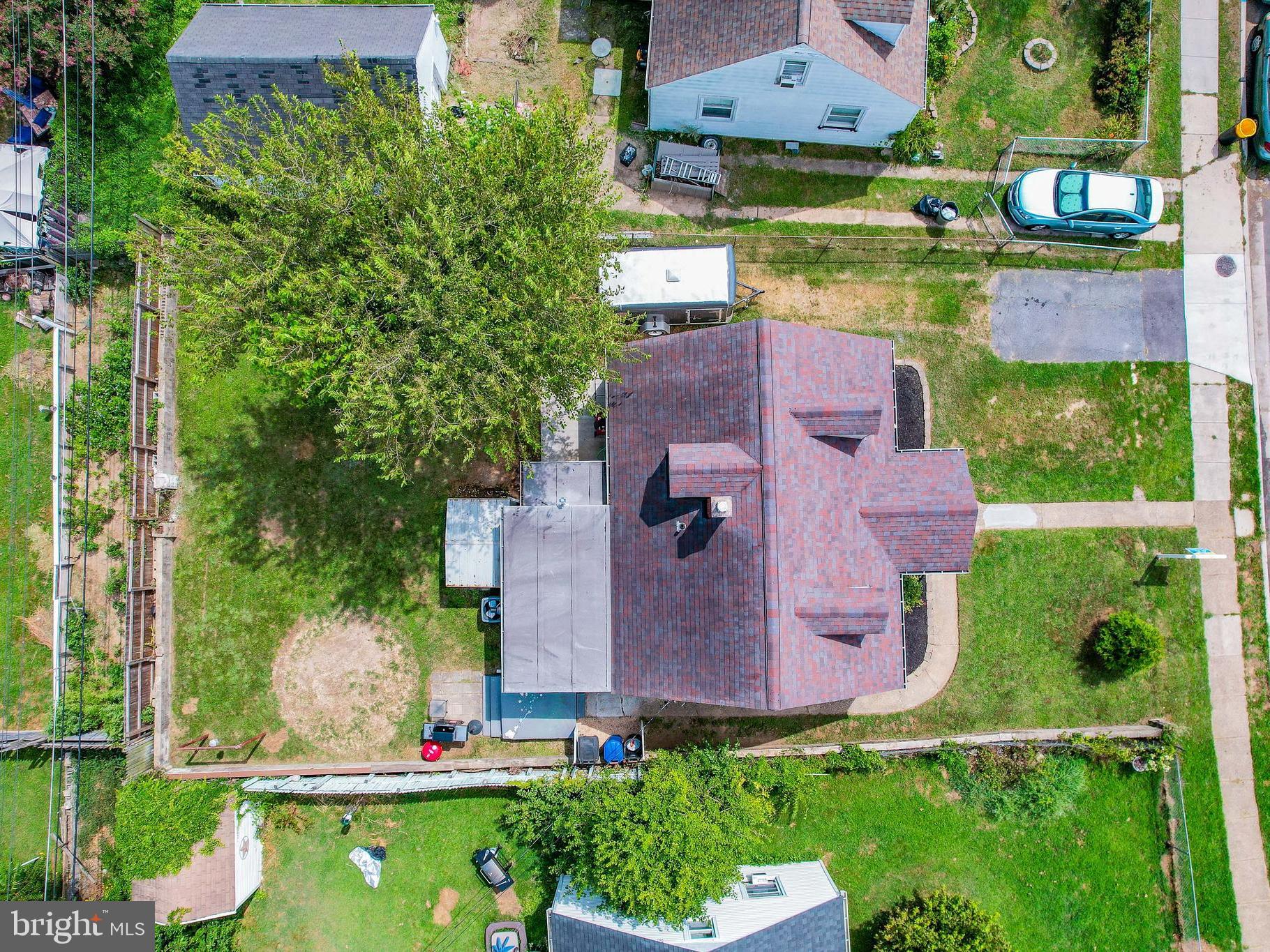 8222 Cornwall Road Dundalk, MD 21222 - Photo 4 of 31 an aerial view of a house with a garden and yard