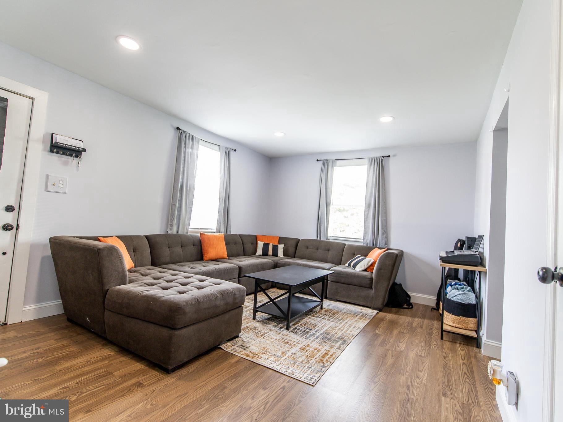 8222 Cornwall Road Dundalk, MD 21222 - Photo 6 of 31 a living room with furniture and a window