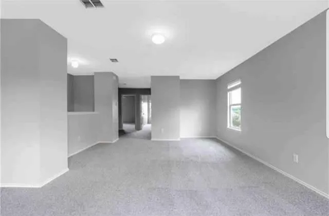 a view of a livingroom and a window