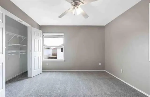 a view of a backyard of the house