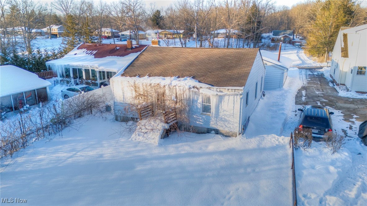 14750 Schreiber Road Maple Heights, OH 44137 - Photo 42 of 44 Snowy aerial view with a residential view