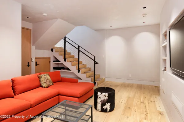 a blue room with furniture