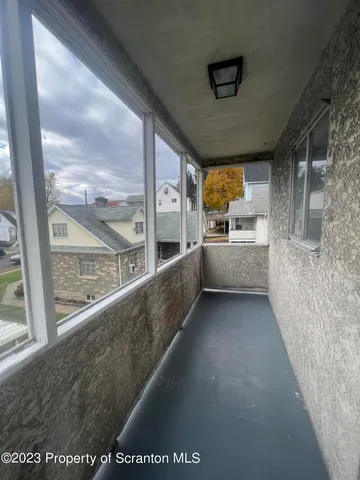 a view of a kitchen with a window