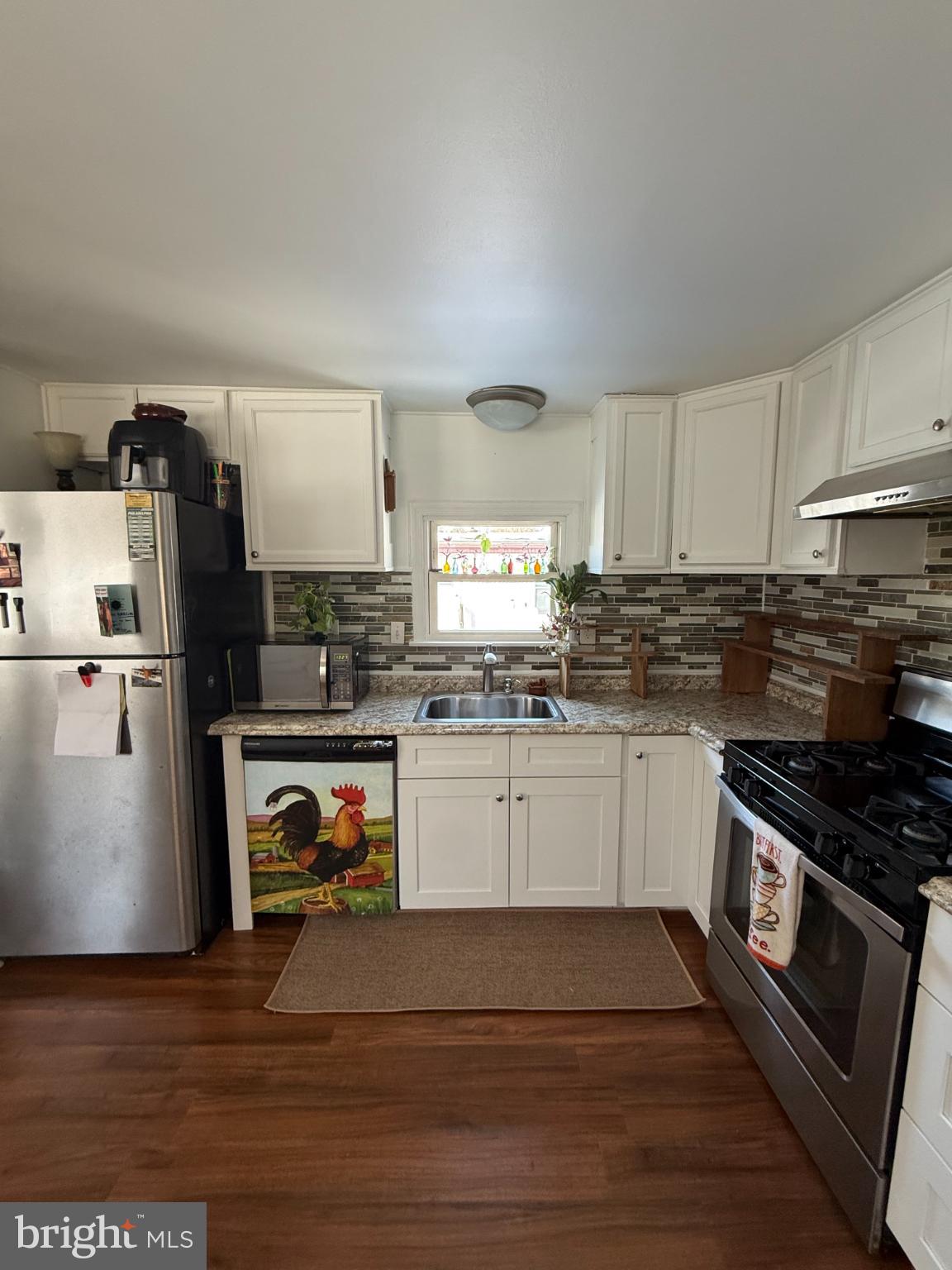 7 Oak Drive Spring City, PA 19475 - Photo 15 of 17 a kitchen with granite countertop a refrigerator stove and sink
