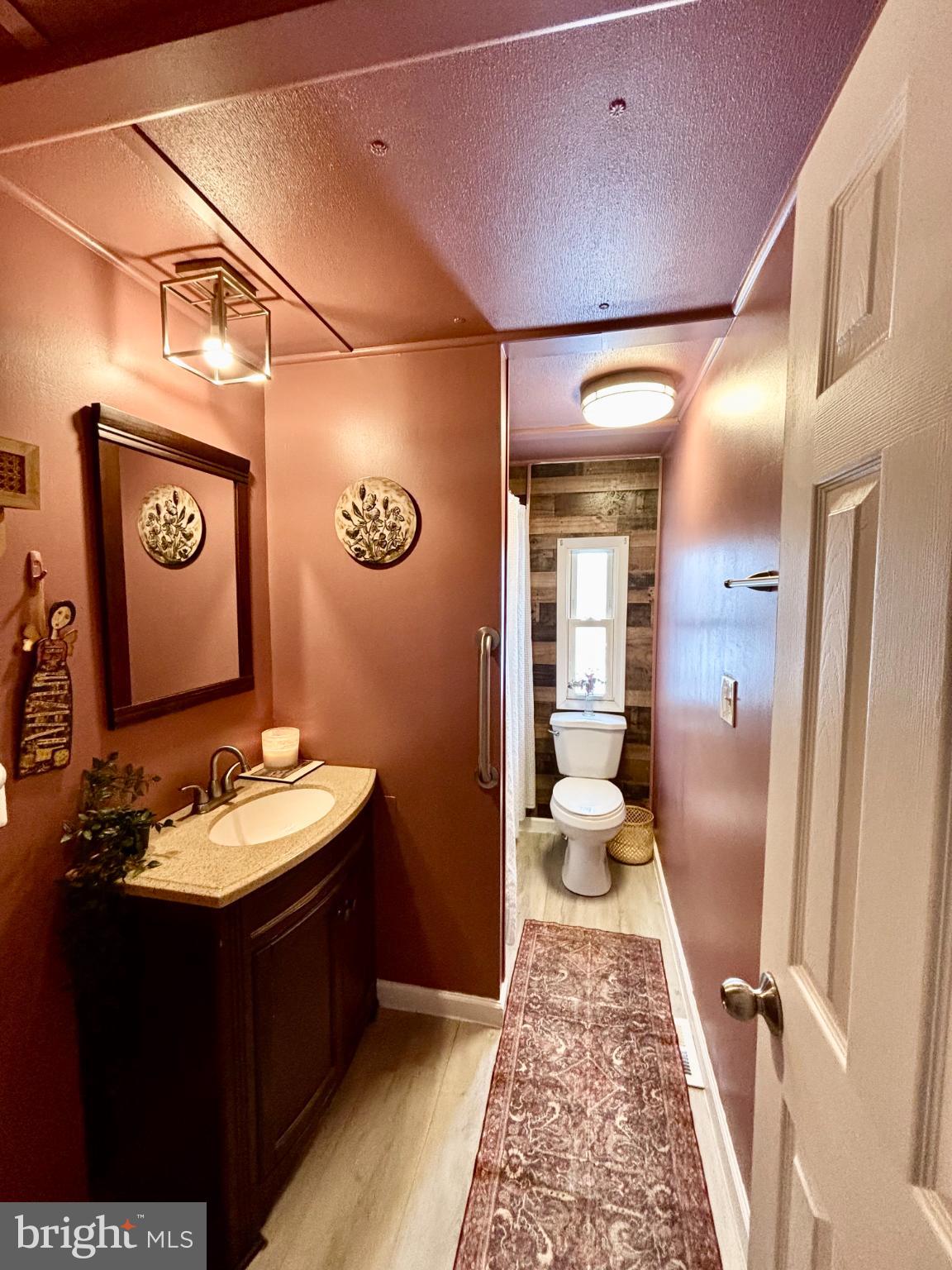 7 Oak Drive Spring City, PA 19475 - Photo 10 of 17 a bathroom with a sink and a mirror