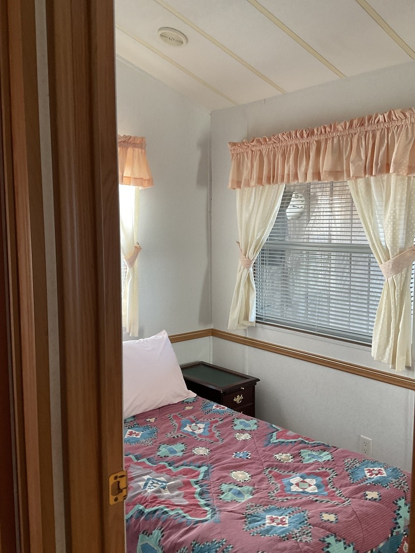 253 Misty Ridge Lakemoor, IL 60051 - Photo 2 of 16 a bedroom with a bed and a window