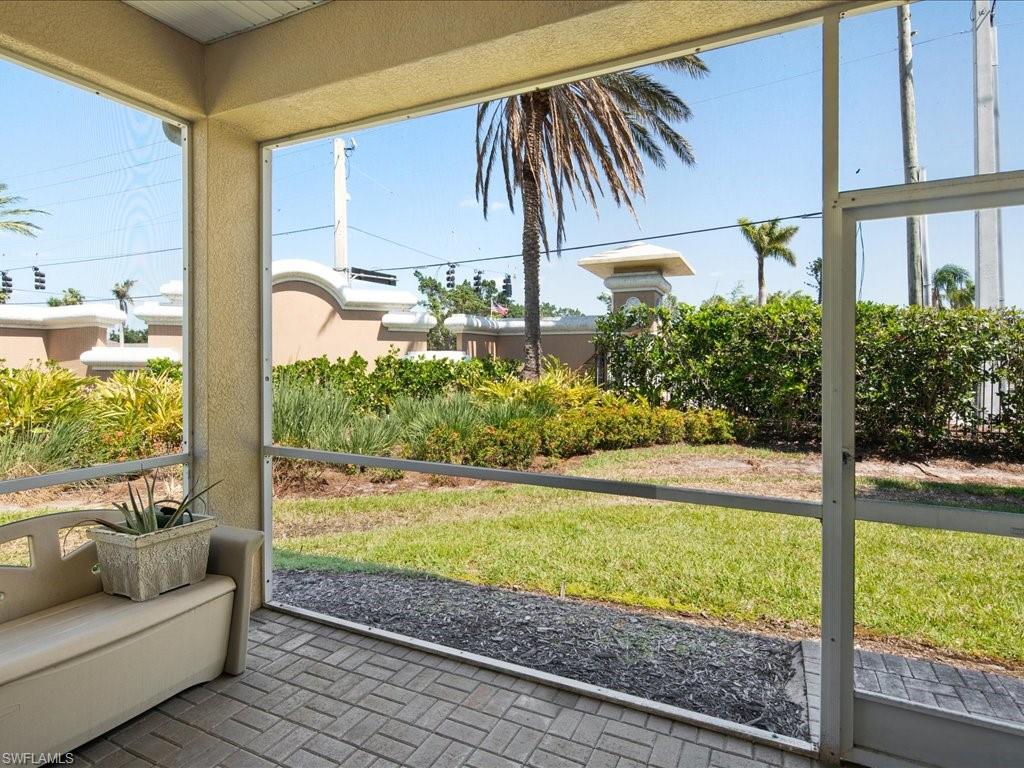 8679 Spring Mountain Way Fort Myers, FL 33908 - Photo 9 of 21 a view of a room with a large window and wooden floor