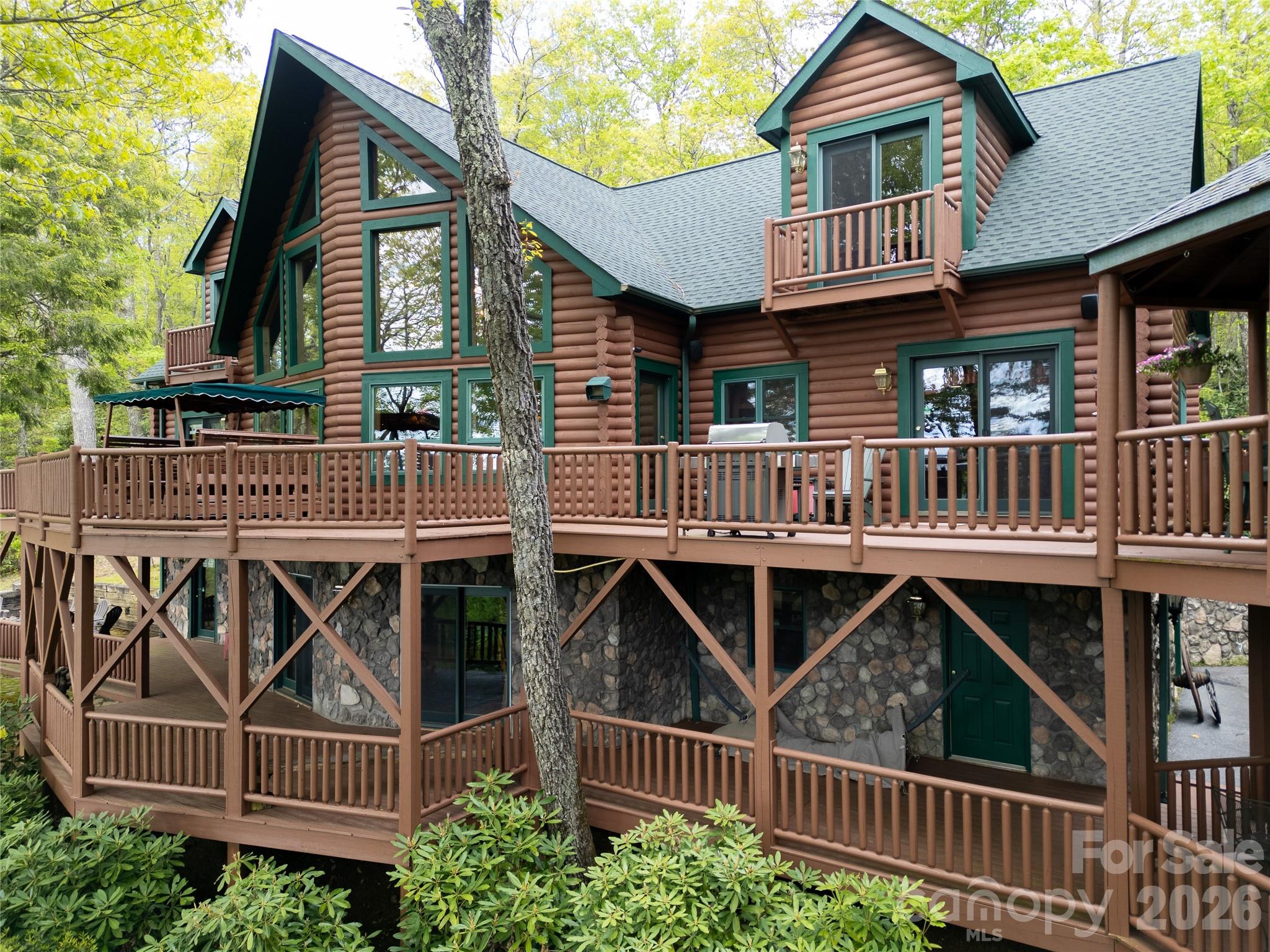 35 Falcon Crest Loop Maggie Valley, NC 28751 - Photo 1 of 46 an outside view of house along with deck and deck