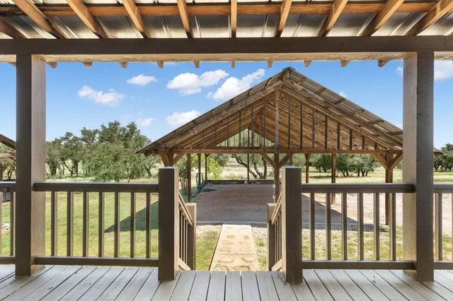 a view of a fireplace in a back yard