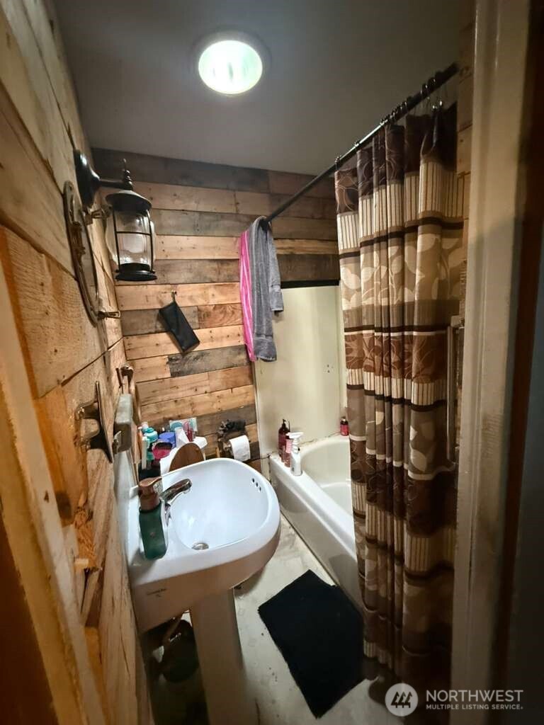 1671 Northeast Mission Creek Road Belfair, WA 98528 - Photo 21 of 31 a bathroom with a sink toilet and shower