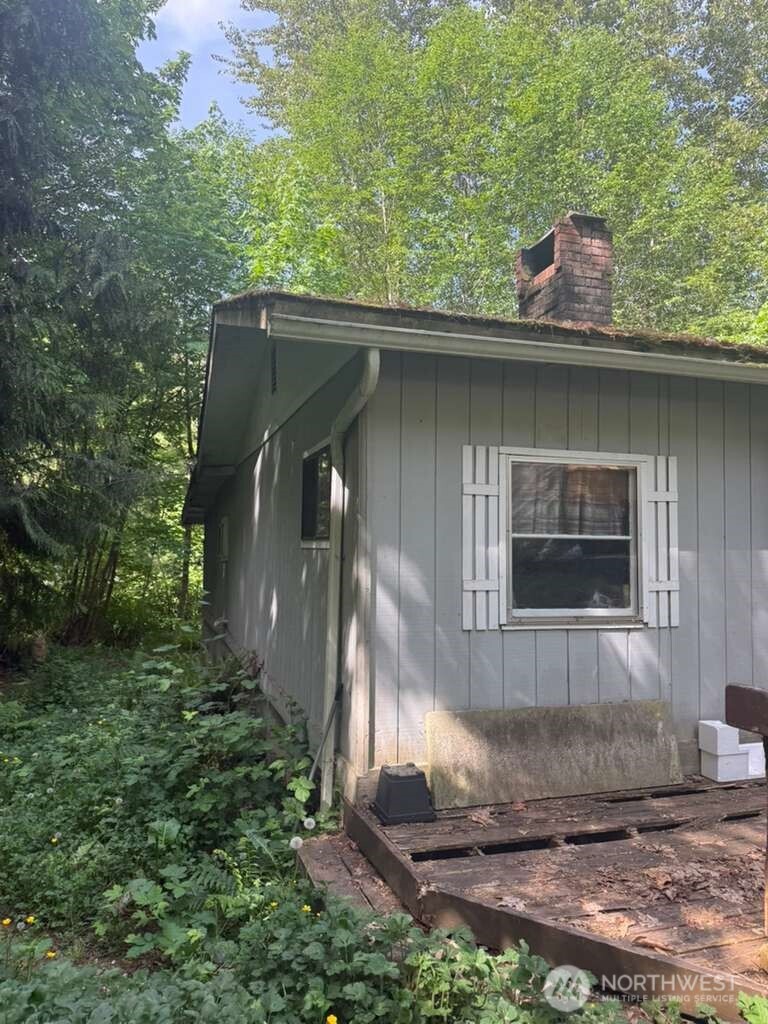 1671 Northeast Mission Creek Road Belfair, WA 98528 - Photo 4 of 31 a backyard of a house