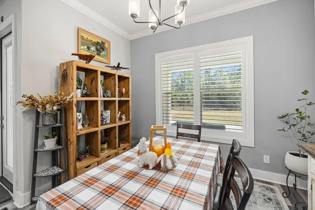 a view of a dining room with furniture