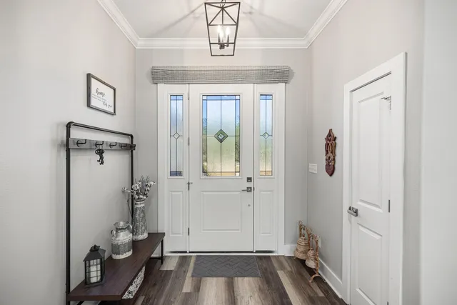 a view of a swimming pool with a lounge chair