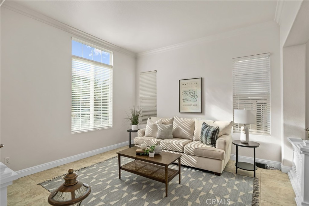 6124 Risingstar Drive Eastvale, CA 92880 - Photo 6 of 37 a living room with furniture and a window