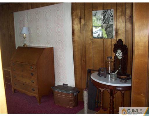 18 Hamlin Road East Brunswick, NJ 08816 - Photo 3 of 10 a bathroom with a sink and a mirror