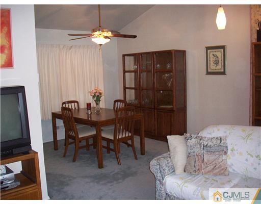 18 Hamlin Road East Brunswick, NJ 08816 - Photo 6 of 10 a bedroom with a bed and a table