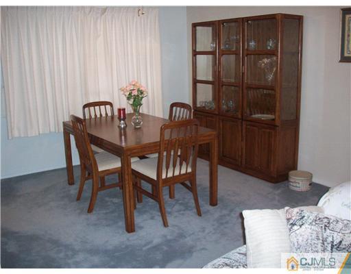 18 Hamlin Road East Brunswick, NJ 08816 - Photo 7 of 10 a dining room with furniture and window