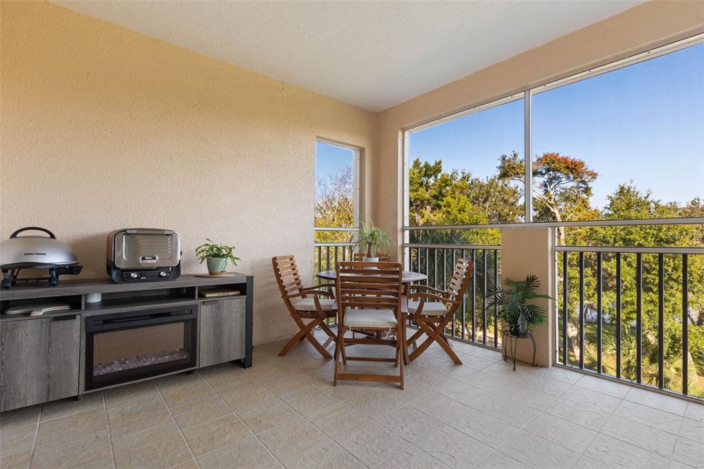 55 Riverview Bend South, Unit 2033 Palm Coast, FL 32137 - Photo 12 of 75 a view of a dining room with furniture window and outside view