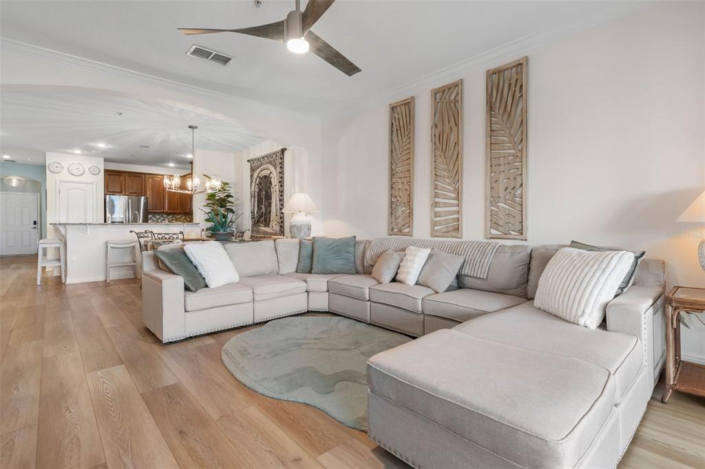 55 Riverview Bend South, Unit 2033 Palm Coast, FL 32137 - Photo 16 of 75 a living room with furniture and a large window