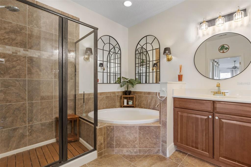 55 Riverview Bend South, Unit 2033 Palm Coast, FL 32137 - Photo 29 of 75 a bathroom with double vanity sink and a mirror