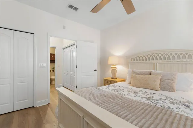 an aerial view of a house with garden space and street view