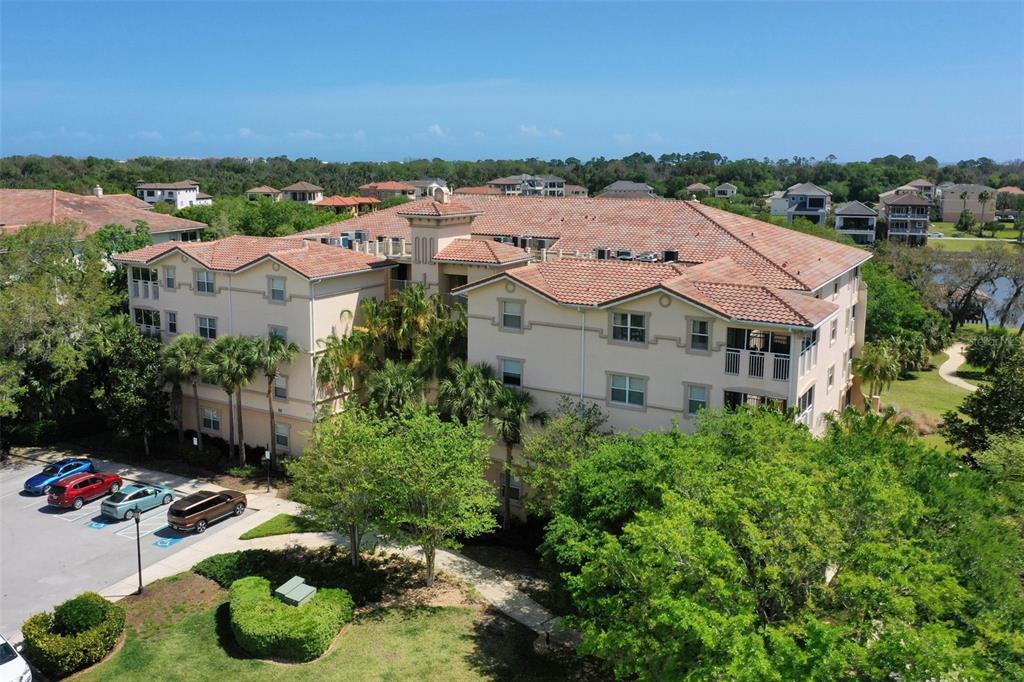 55 Riverview Bend South, Unit 2033 Palm Coast, FL 32137 - Photo 41 of 75 an aerial view of residential houses with outdoor space