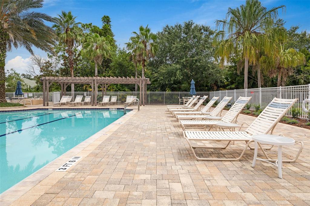 55 Riverview Bend South, Unit 2033 Palm Coast, FL 32137 - Photo 59 of 75 a view of swimming pool with chairs